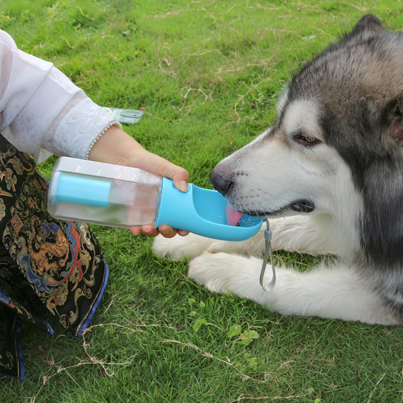 3-in-1 Pet Water Bottle – Feeder, Drinker & Poop Bag Dispenser