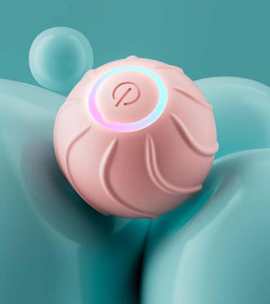 Pink ball with a power symbol on a teal background